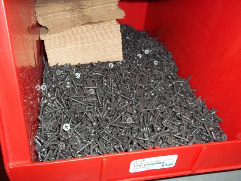 lot 291 image: Red Stacking Bin Full of Sheet Rock Screws 1 in