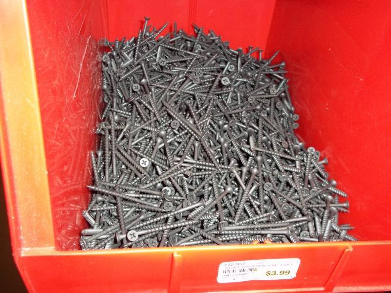 lot 293 image: Red Stacking Bin Full of Sheet Rock Screws 2 12 in
