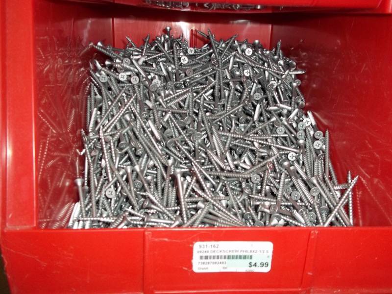 lot 294 image: Red Stacking Bin Full of Deck Screws 2 12 in