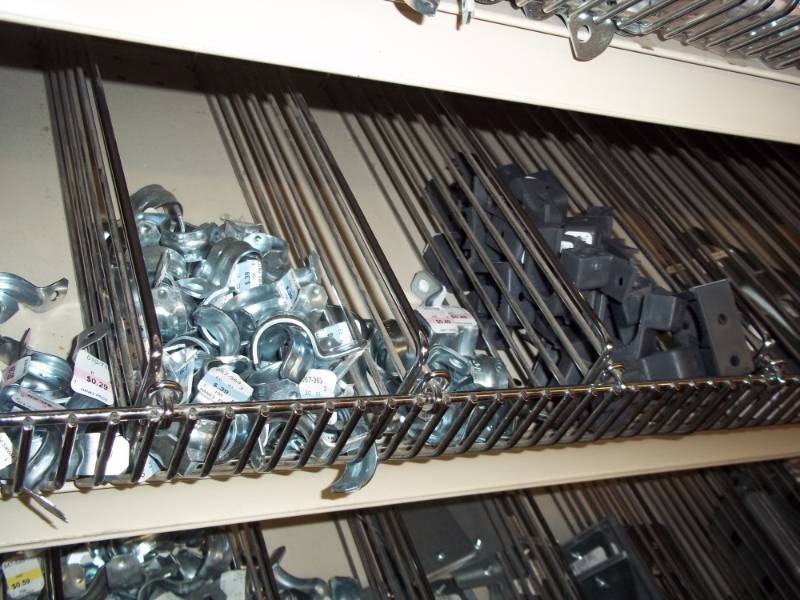 lot 302 image: 4 ft Shelf Lot includes Conduit straps, cover plates, etc