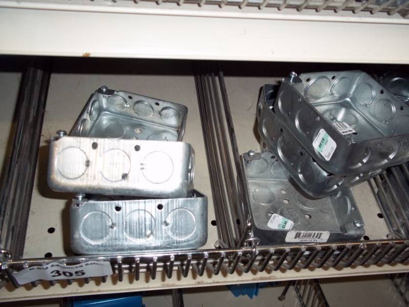 lot 305 image: 4 ft Shelf Lot includes Metal Electrical Boxes