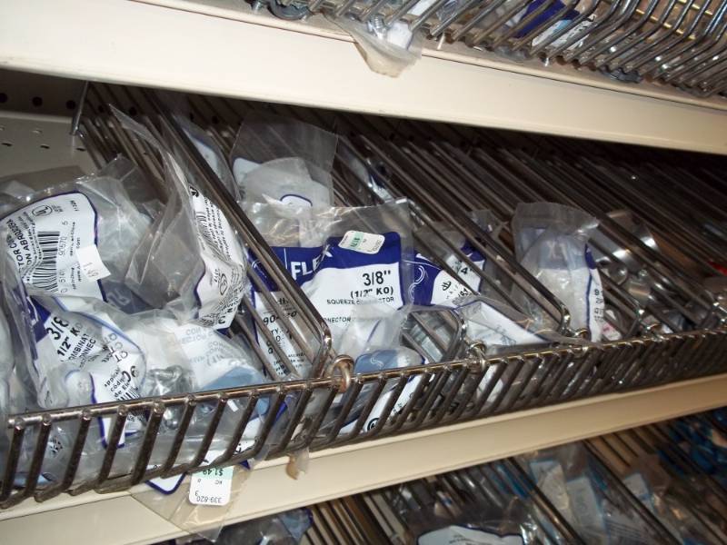 lot 327 image: 4 ft Shelf Lot includes cable connectors, conduit parts, etc