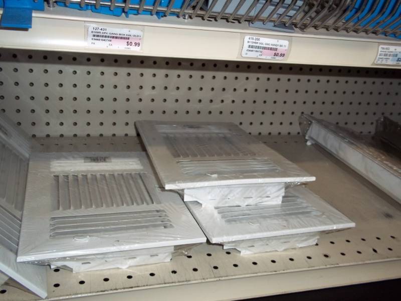 lot 329 image: 4 ft Shelf of Heat Vent Covers