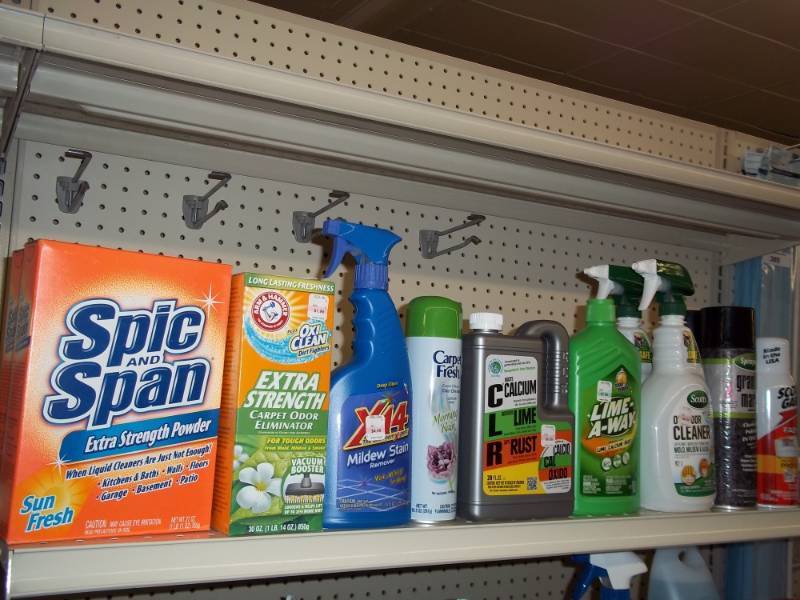 lot 388 image: 4 ft Shelf Lot with misc cleaners including laundry bags