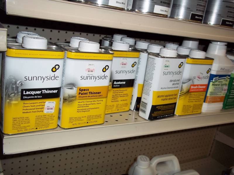 lot 405 image: 4 ft Shelf Lot includes Paint thinner, Brush Cleaner, Mineral Spirits, 2 buckets