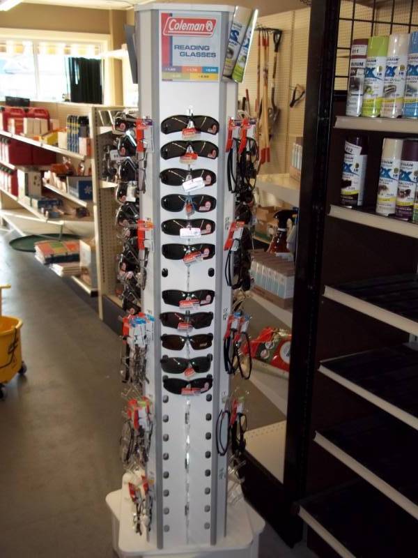 lot 413 image: Coleman Eye Glass Display Stand includes 95 pairs of Reading Glasses, Sunglasses, Safety Glasses, etc