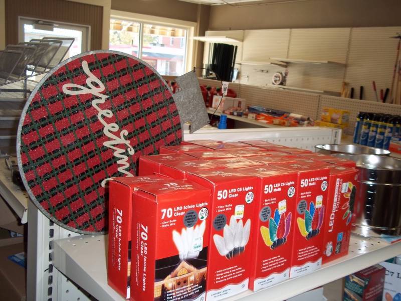 lot 495 image: Shelf Lot including 24 Boxes of Christmas Light Bulbs, 2 buckets of Cookie Cutters, etc