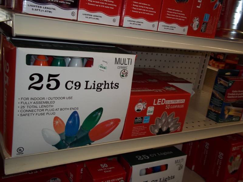 lot 496 image: Shelf Lot including Christmas String Lights, Gutter Hooks, etc