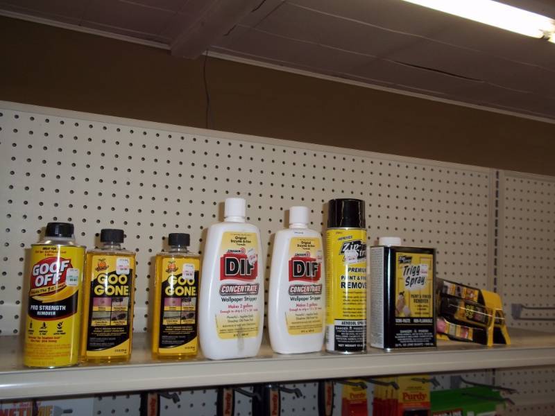 lot 518 image: Shelf Lot including Goo Gone, Wall Paper Stripper, etc