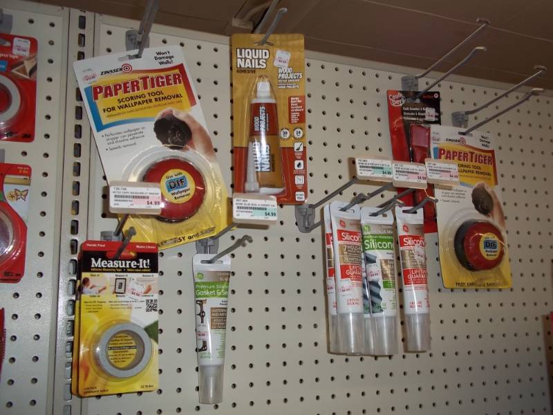 lot 535 image: Wall Lot includes Liquid Nails, Silicone, Wall Paper Removing Tool, etc