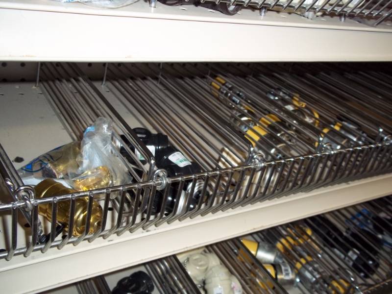 lot 687 image: Shelf Lot Assortment of extension cord ends, bulb splitters, lamp hardware, switch plates