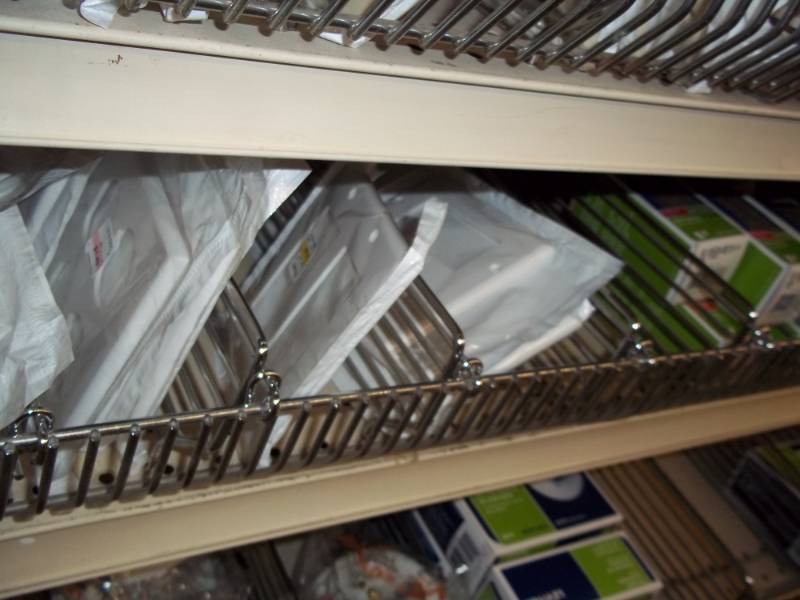 lot 705 image: Shelf Lot Assortment of wall plates, electrical plugins and switches