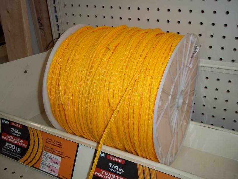 lot 721 image: Roll of Poly Rope 14 in yellow almost full roll of 1000 ft