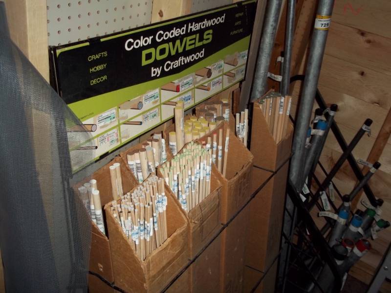lot 730 image: Assortment of Dowels with Display Rack
