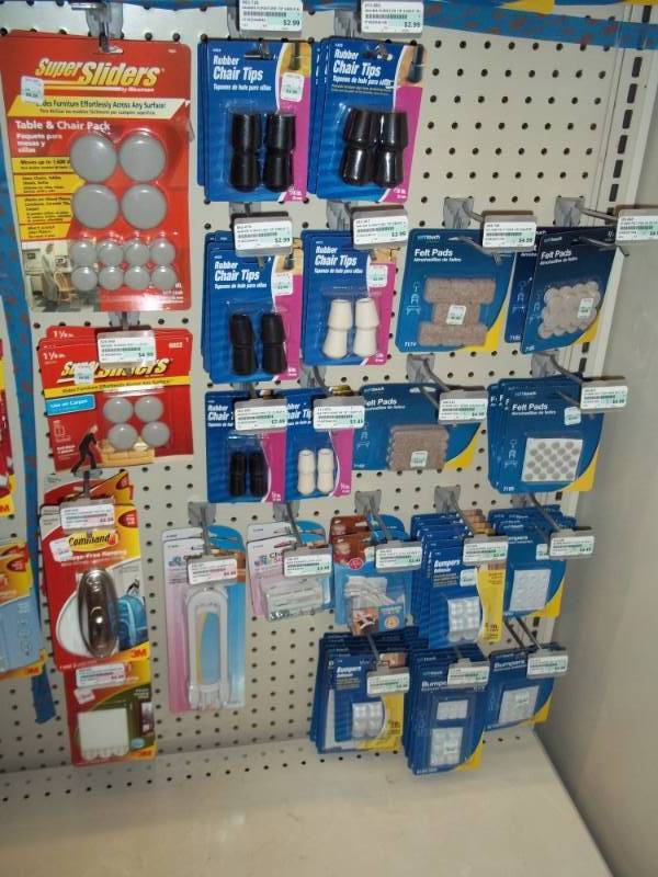 lot 746 image: Wall Lot of Chair Tips, Super Sliders, Child Proof Locks, Command Items, etc