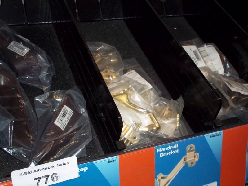 lot 776 image: 4 ft Shelf Lot includes Door Stops, Hinges, Handles, etc