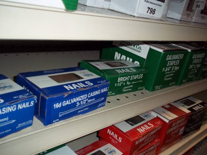 lot 803 image: Shelf Lot of 15 lbs of Variety of Nails includes Galvanized Staples