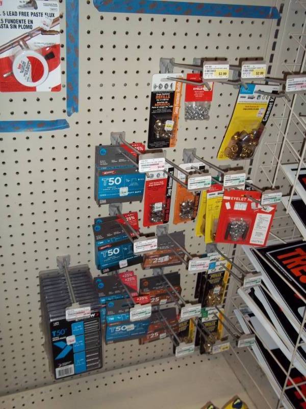 lot 813 image: Wall Lot of Variety of Staples