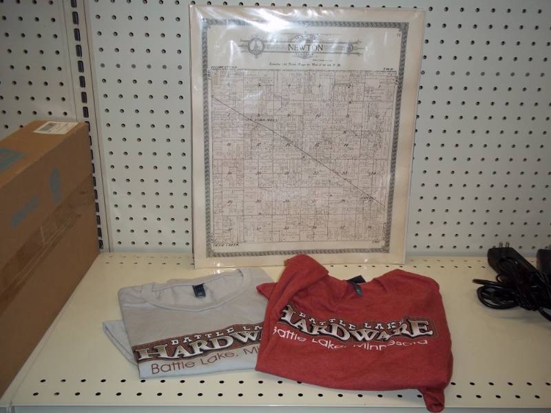 lot 881 image: 2 Battle Lake Hardware T-Shirts small and Newton Township Map
