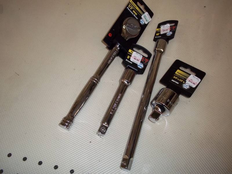 lot 919 image: Drive 12 in Socket Wrench with extension and Adapter