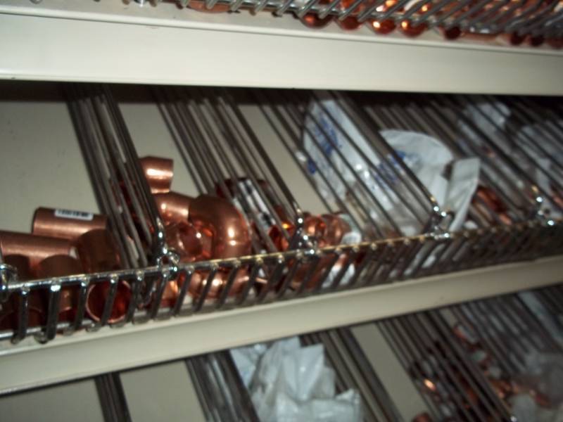 lot 1068 image: 4 ft shelf Lot of Copper Fittings and Valves