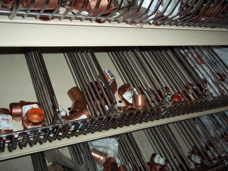 lot 1070 image: 4 ft shelf Lot of Copper Fittings and PVC Valves