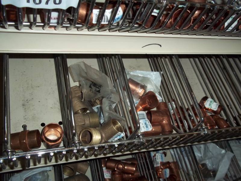 lot 1071 image: 4 ft shelf Lot of Copper Fittings and PVC Valves