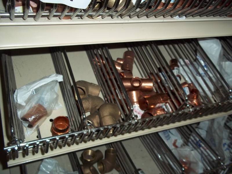 lot 1072 image: 4 ft shelf Lot of Copper Fittings and Valves