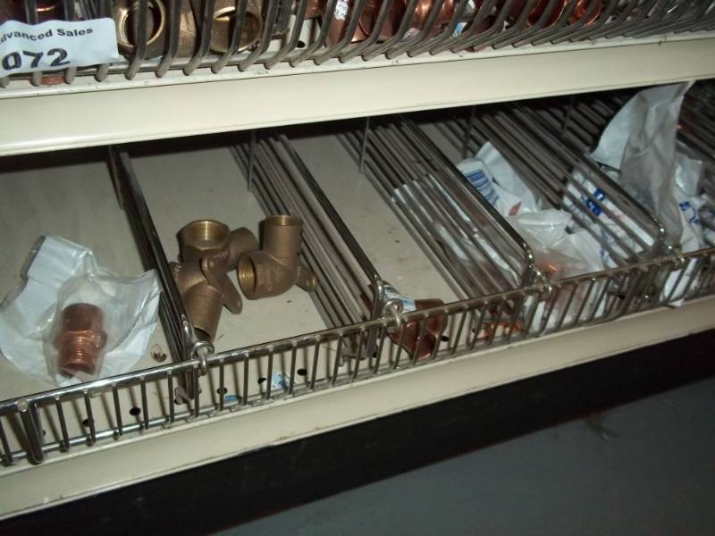 lot 1073 image: 4 ft shelf Lot of Copper Fittings and PVC Valves