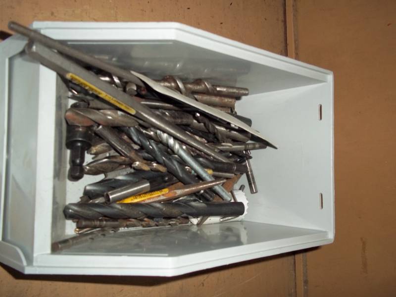 lot 1153 image: Used bin of used drill bits comes with extra plastic bin