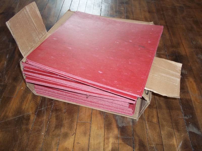 lot 1211 image: One box of Red Congoleum commercial tile flooring