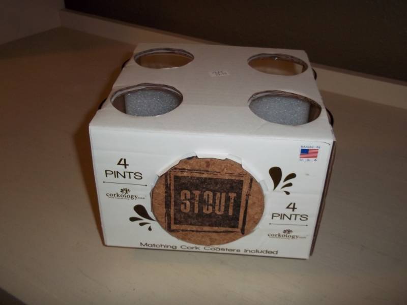 lot 1235 image: 4 Pints with matching cork coasters set