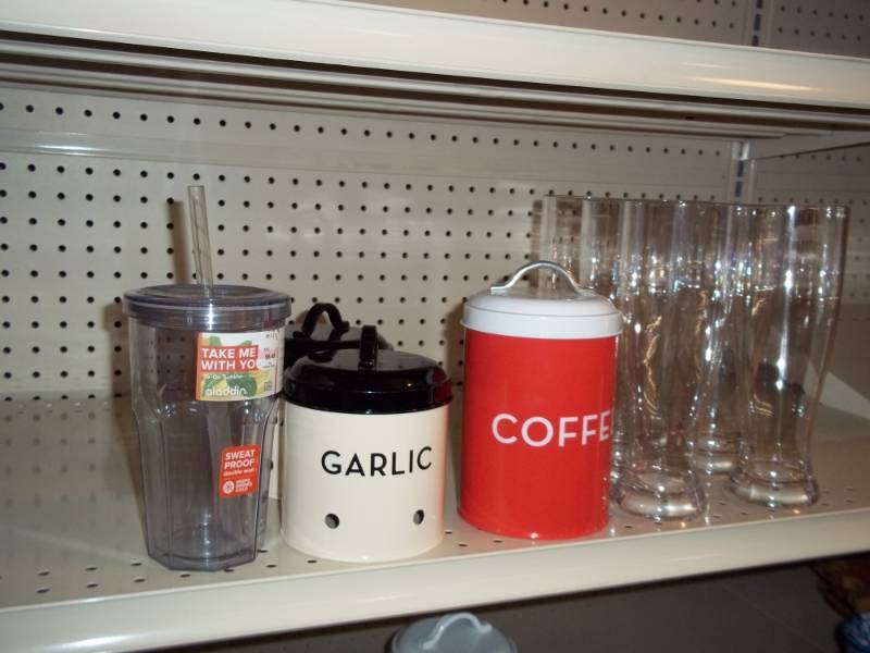 lot 1240 image: Shelf lot with Glasses and garlic and coffee canisters