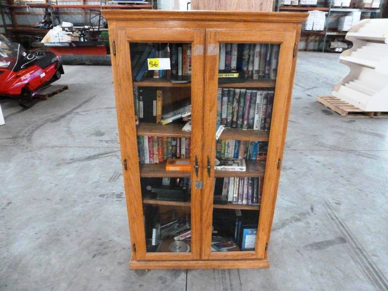 Oak Cabinet Loaded wDVDs, CDs, Video Games
