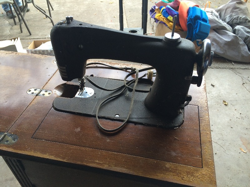 lot 24 image: Vintage Montgomery Ward Sewing Machine and cabinet