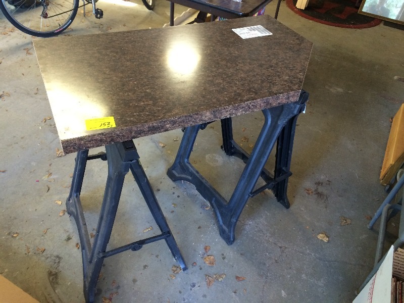 lot 152 image: Foldable Saw Horses  a countertop section approx. 4  long