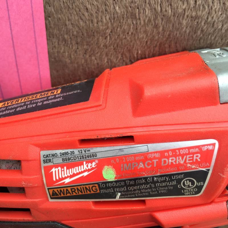 lot 24 image: Milwaukee Drill charger and Battery works well