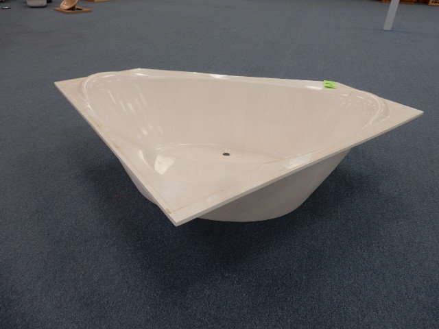 Heavy Composite almost stone like Corner Bathtub unit.. .