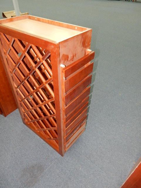 Wine Rack with hanging slats on sides.  Matches cabinets in lots 11, 12, 14.