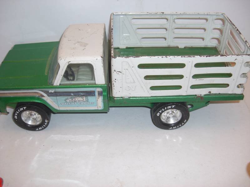 Pressed SteelMetal Toys  Nyland Farms, Marx Wind-up Tractor, Tootsie Toys & Mail Box Bank