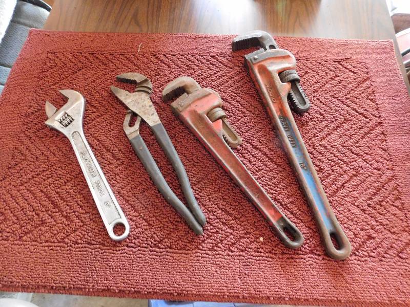 lot 22 image: pipe wrenches and channel locks