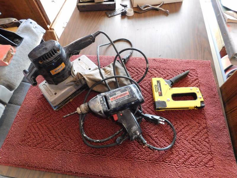 lot 28 image: sander drill and stapler