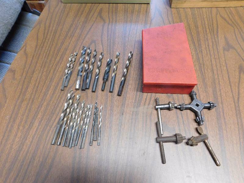 lot 46 image: many drill bits and several chucks for drills