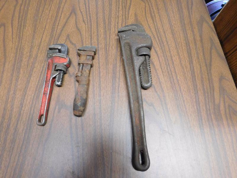 lot 51 image: three pipe wrenches one is vintage