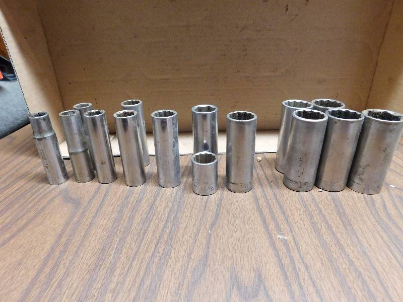 lot 112 image: deepwell 12 to 1-18  standard sized Craftsman  sockets good condition usable