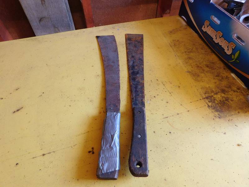 lot 118 image: two vintage machetes