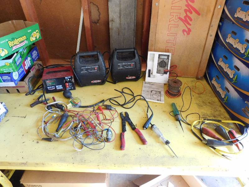 lot 123 image: large lot of battery chargers and other auto test devices see photos