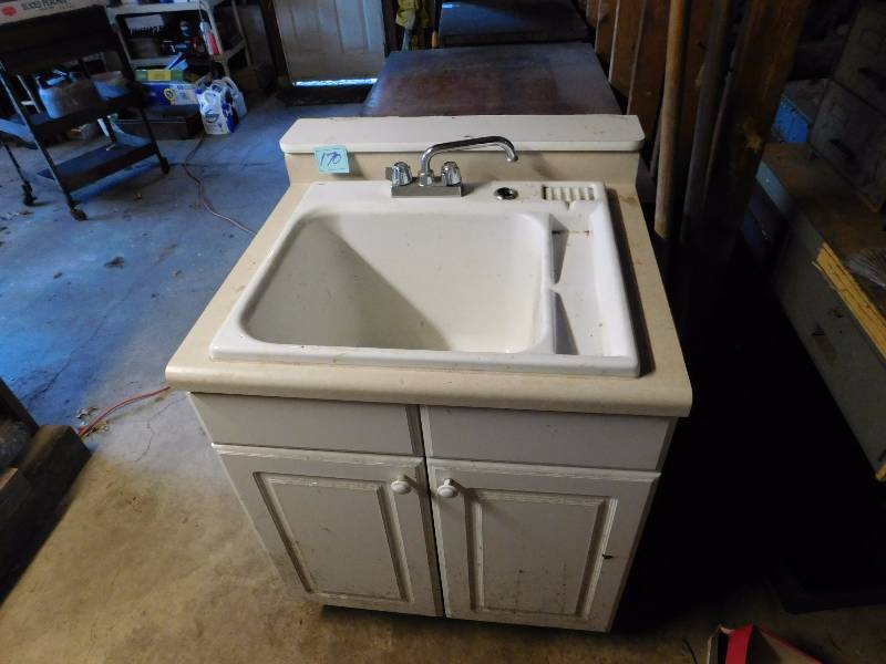 lot 165 image: vintage deep sink and vanity with plumbing and faucet worked when removed