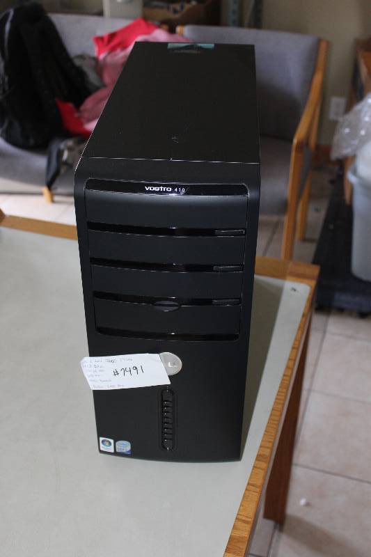 lot 5 image: Dell desktop, Quad core Q6600 CPU 2.4GHz 4GB ram, 250GB Hard drive, DVD-ROM, radeon 2400 pro video card, vista business installed, tested and operational