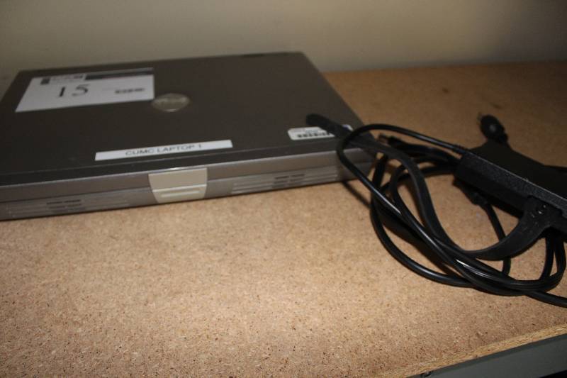 lot 15 image: Dell laptop with ac adapter, as is for parts